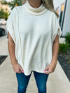 Creme Poncho Top